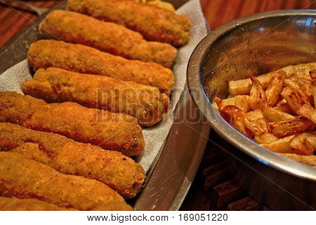 Fried stuffed Karadjordje schnitzel and french fries
