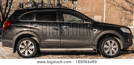 Kazakhstan, Ust-Kamenogorsk, 22 january, 2017: Chevrolet Captiva, side view, black car