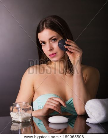 Pretty Young Woman With Cosmetics