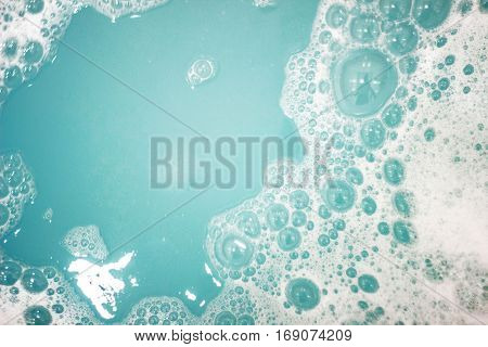 blue foam bath bombs, abstraction, the picture can be used as a background, color water