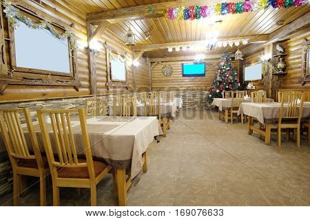 Interior of a cafe in a wooden house