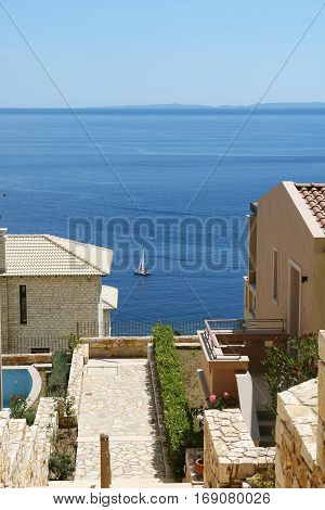 Stairway to the sea and panoramic views of the Ionian Sea to the island.