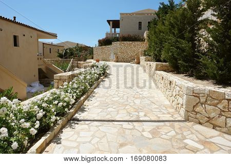 Sivota Greece - May 09 2013: The territory of modern stylish high class hotel on the Ionian coast of Greece.