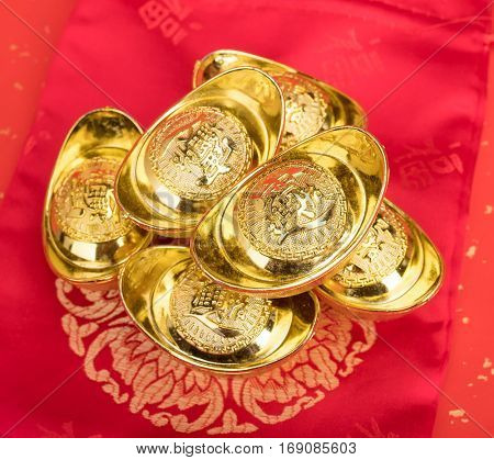 Chinese gold ingot mean symbols of wealth and prosperity.