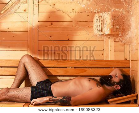 Handsome Man Relaxes In Sauna