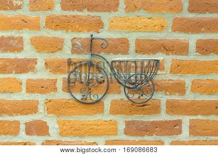 Ornament handicraft bicycle miniature hanging on brick wall