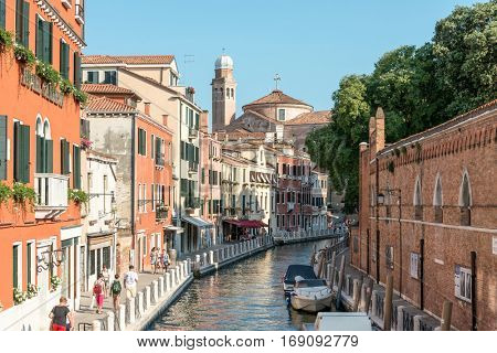 VENICE, ITALY - March 26, 2016. Beautiful view of water street and old buildings in Venice on May 26, 2015. its entirety is listed as a World Heritage Site, along with its lagoon.May 26 VENICE, ITALY