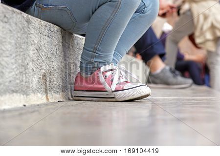 close up from baby shoes sitten on stairs .