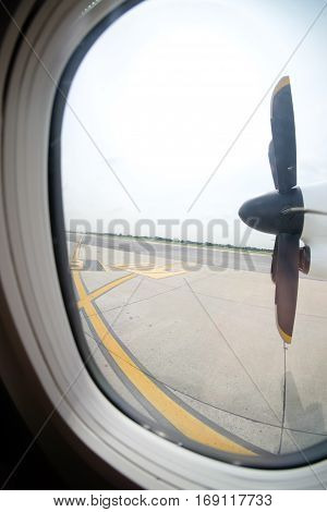 Detail of the propeller airplane at the airport. Plane motor with propeller.