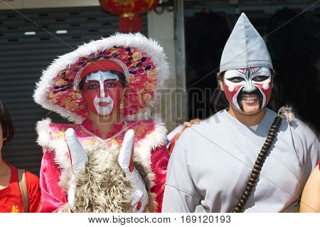 NAKHONSAWAN ,THAILAND - JANUARY 31,2017 : Unidentified fighting show of villager warriors ( Aung-Gor ) on the street in city during the Chinese New Year celebrations in Nakhonsawan Province,Middle of Thailand.