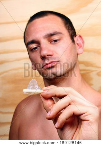 Young Man With Condom