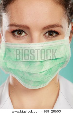 Portrait Of Female Doctor In Mask