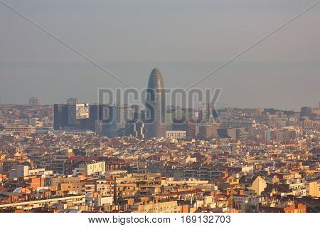 Barcelona Spain - January 03 2017: Agbar tower in the background of the urban landscape of Barcelona