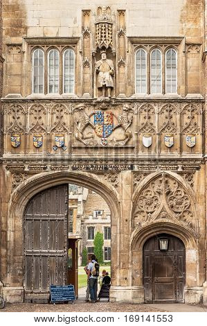 Cambridge Cambridgeshire United Kingdom - June 24 2006: The Great Gate is the entrance to Trinity College in Cambridge University. The gate features a statue of King Henry VIII who founded Trinity College in 1546.