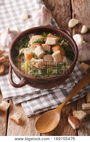 Traditional Soup With Garlic And Croutons Close-up. Vertical