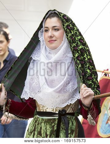 CAGLIARI, ITALY - May 1, 2014: 358 Religious Procession of Sant'Efisio - Sardinia - portrait of a beautiful girl in traditional Sardinian costume