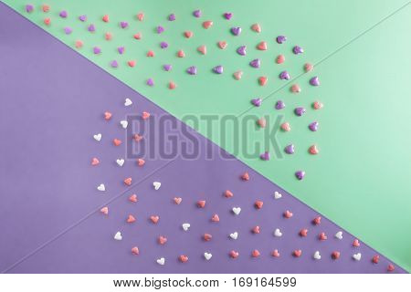 beautiful flat lay pattern of hearts with copy-space on tiffany and serenity background for Valentine's Day