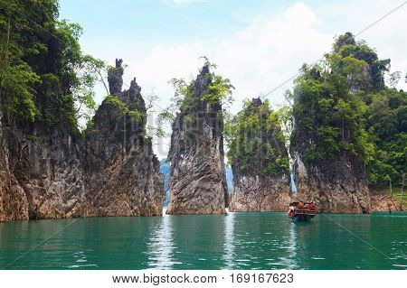 Beautiful mountains lake and natural attractions in Ratchaprapha Dam at Khao Sok National Park Guilin of Thailand.