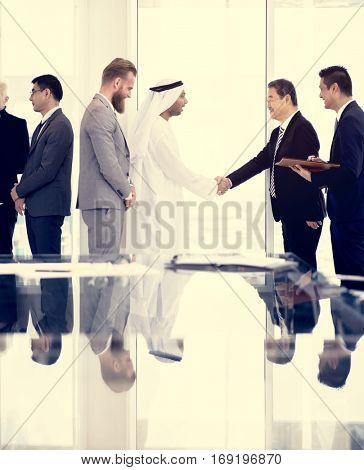 Business Partners Introductionary Handshake Bow