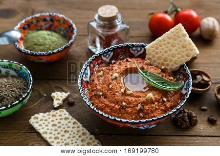 Muhammara Traditional Arabian Appetizer On The Table Close-up. Vertical