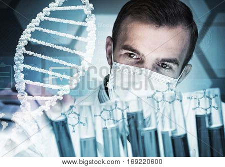 Handsome scientist making research over dna molecule structure