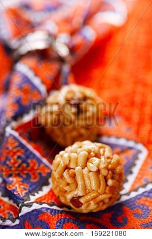 Chak-chak traditional asian sweet dessert - fried dough with honey