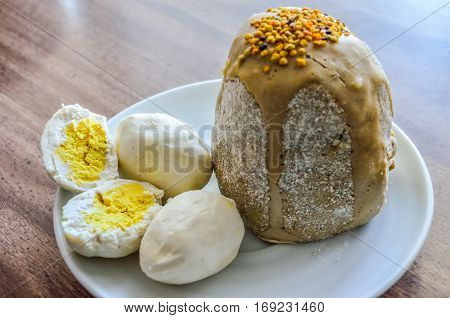 Easter food with Kulich cake and eggs (vegan or vegetarain version)