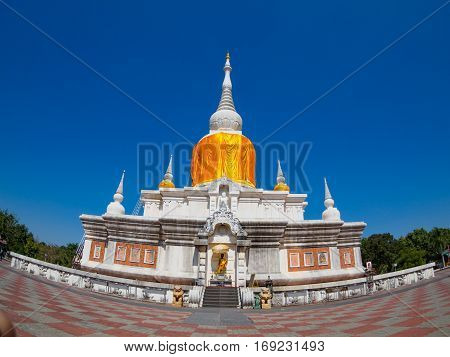 Ancient pagoda architecture In Thailand, Phra That Na Dun , Maha Sarakham Province with blue sky background