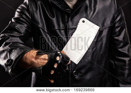 Maniac with knife on dark background