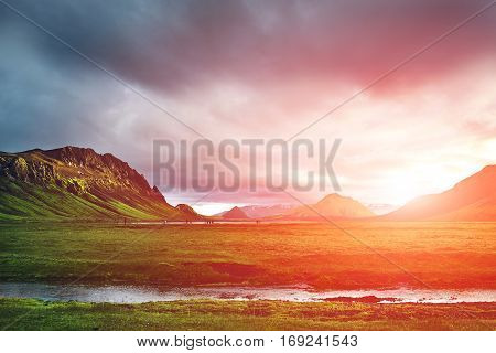 Travel to Iceland. Beautiful Icelandic landscape with mountains, sky and clouds. Trekking in national park Landmannalaugar. Rainy Evening in Camping near Alftavatn lake.