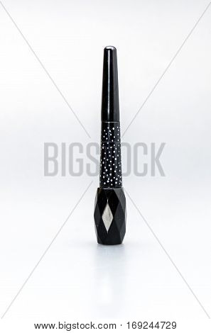 Eyeliner bottle beauty makeup cosmetic on studio
