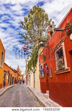 Aldama Street Christmas Decorations Parroquia Archangel church Dome Steeple San Miguel de Allende Mexico. Parroaguia created in 1600s.