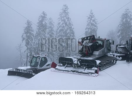 Sochi, Russia - January 21, 2017: Snow grooming on slope of ski resort Gorky Gorod