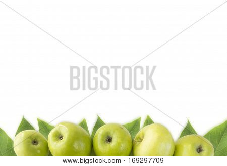 Horizontal seamless background with green apples and leaves. Fresh apples on a white background. Apples at border of image with copy space for text.