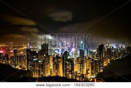 Business concept for real estate and corporate construction - panoramic modern city skyline bird eye aerial view with night sky in Hong Kong (HK) China