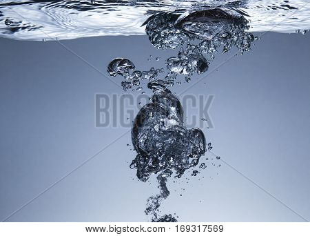 Air bubbles in water, similar to the liquid melal