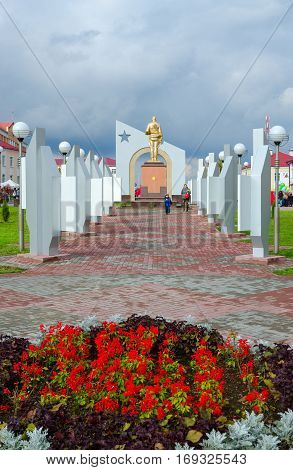 SENNO BELARUS - OCTOBER 8 2016: Unidentified people walk on Alley of Heroes in Senno Vitebsk region Belarus