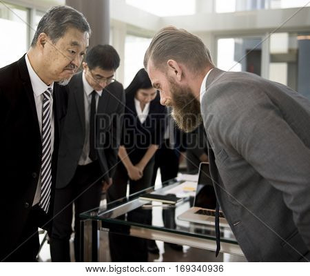 Business Partners Introductionary Handshake Bow