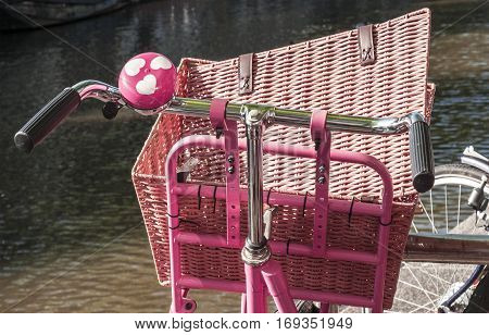 Bicycle detail. Red bike bell and basket