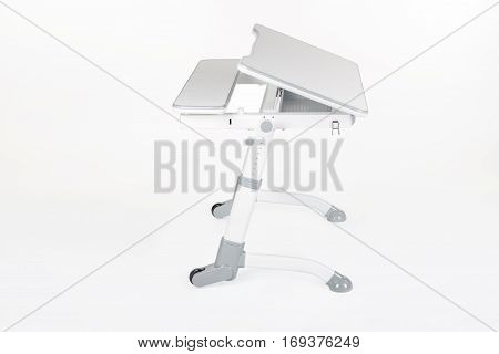 School desk and chair gray color on a white background isolated