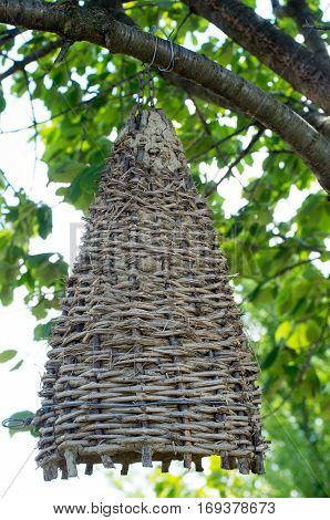 Ancient beehive. Braided hive of twigs. Trap bee swarms. Bee basket.