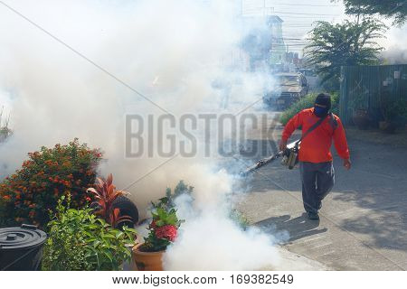 Officers are being injected smoke removal substance mosquitoes sprayer and larvae. To prevent the spread of disease from mosquitoes.