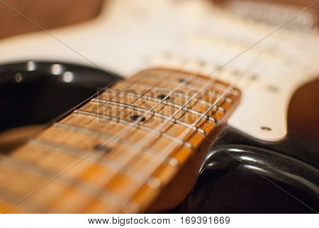 Vintage Stratocaster electric guitar maple neck close up
