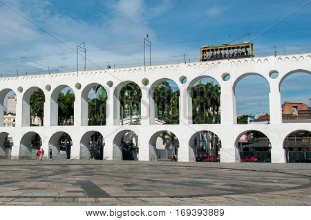 Lapa Arch and Famous Santa Teresa Tram Passing on the Top, Rio de Janeiro, Brazil