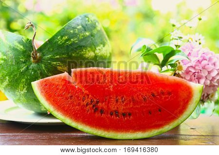 Red Ripe Cut Water Melon With Hydrangea Bouquet