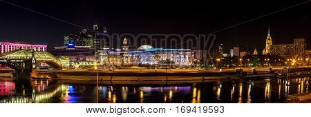 Moscow Russia - January 20 2017: Night winter panorama of the Moskva River embankment: pedestrian bridge Bogdan Khmelnitsky 