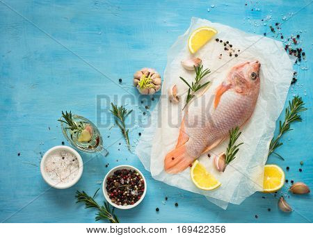 Fresh raw fish tilapia. Nile tiapia Oreochromis niloticus. Top view. Food cooking background.