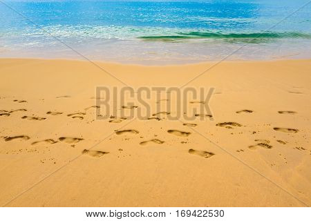 close up Footmark in the Sand on Beach at Thailand