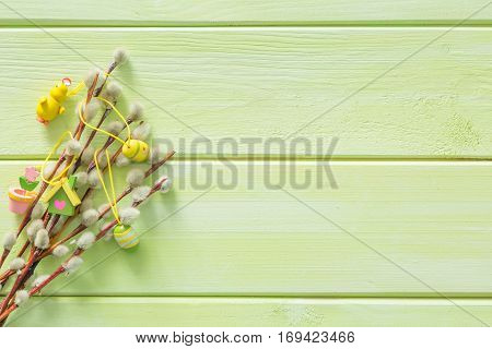 Easter background with flaffy willow and decorations, copy space