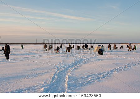 Fisherman enjoying a days fishing on the ice